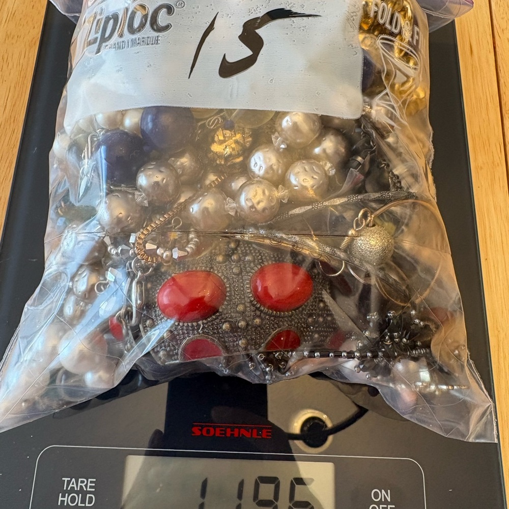1KG Mixed Untested Jewelry Bag with Red and Silver Accents. LOT 15